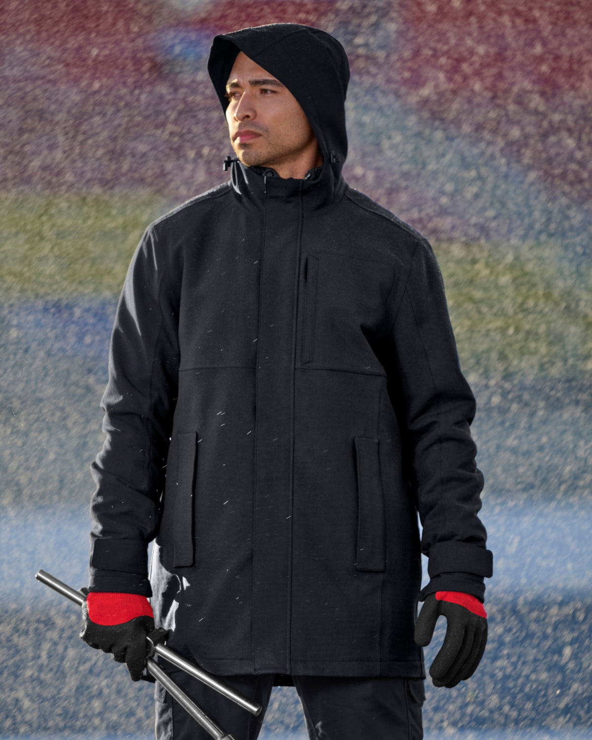 STRAUSS e.s.e:pic waterproof rain coat in black worn in a work setting
