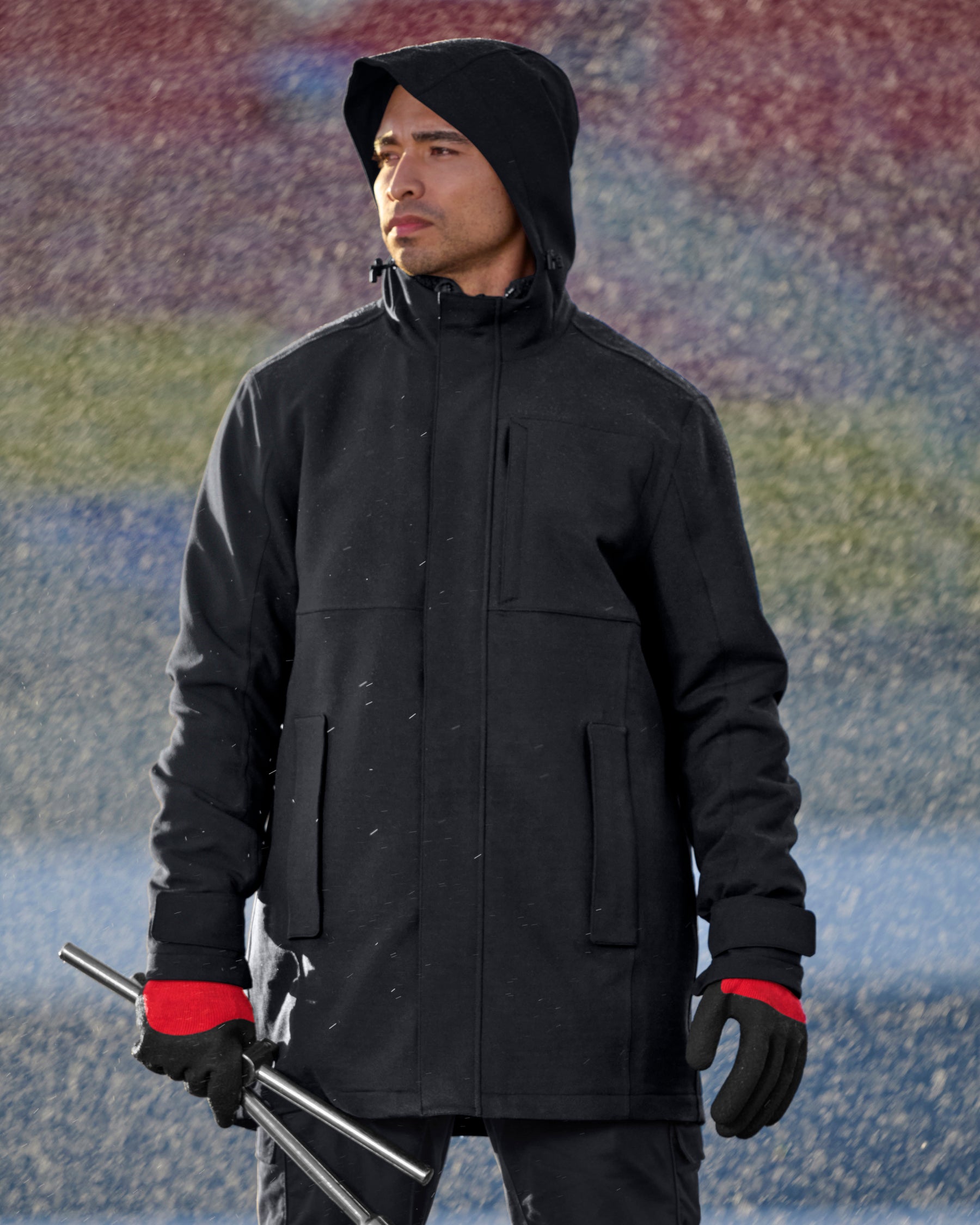 STRAUSS e.s.e:pic waterproof rain coat in black worn in a work setting