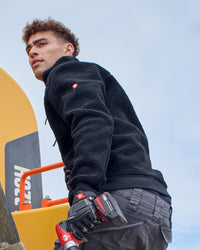 STRAUSS e.s.e:pic sherpa fleece jacket in black in use on the job