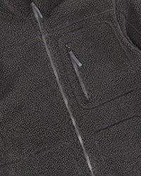 Close-up of sherpa fleece texture and collar details on STRAUSS e.s.e:pic sherpa fleece jacket in black