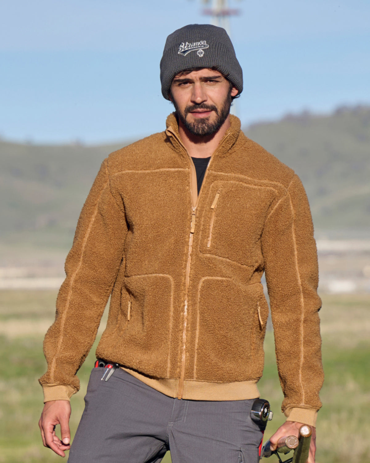 STRAUSS e.s.e:pic sherpa fleece jacket in almond brown worn in a work setting