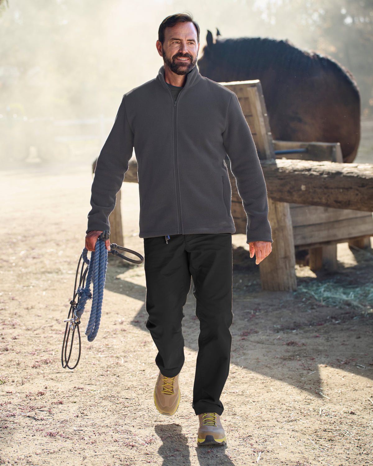 Chino Pants e.s.e:pic in black shown in an outdoor workwear setting