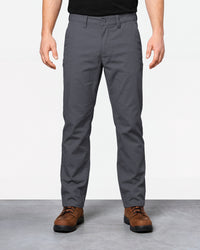 Chino Pants e.s.e:pic in carbon gray worn by a model, front view