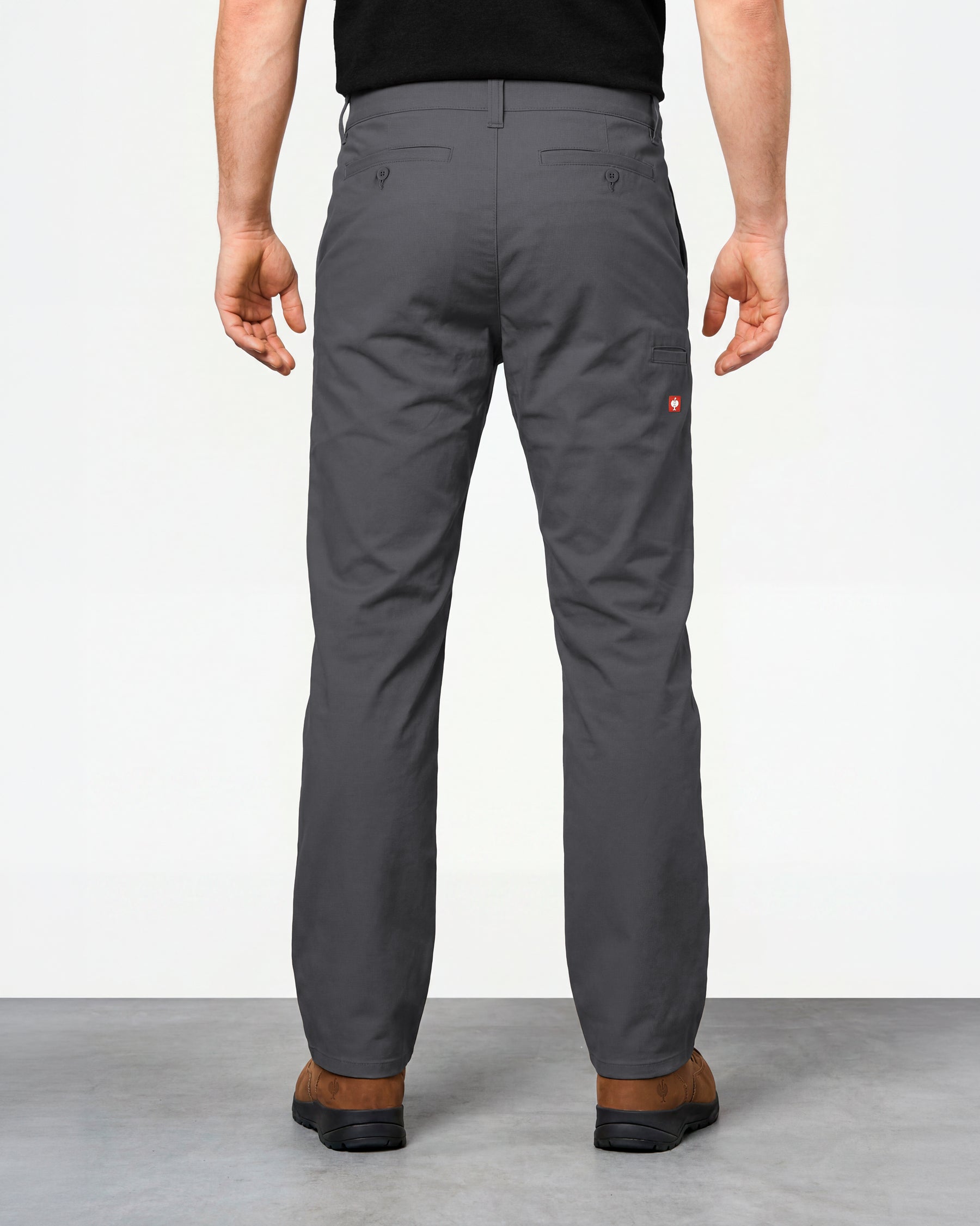 Chino Pants e.s.e:pic in carbon gray worn by a model, rear view
