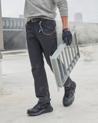Chino Pants e.s.e:pic in carbon gray worn in a work setting