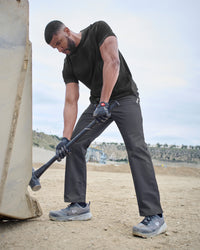 Chino Pants e.s.e:pic in carbon gray in use, showing fit and movement