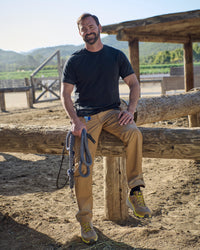 Chino Pants e.s.e:pic in almond brown in use, showing fit and movement
