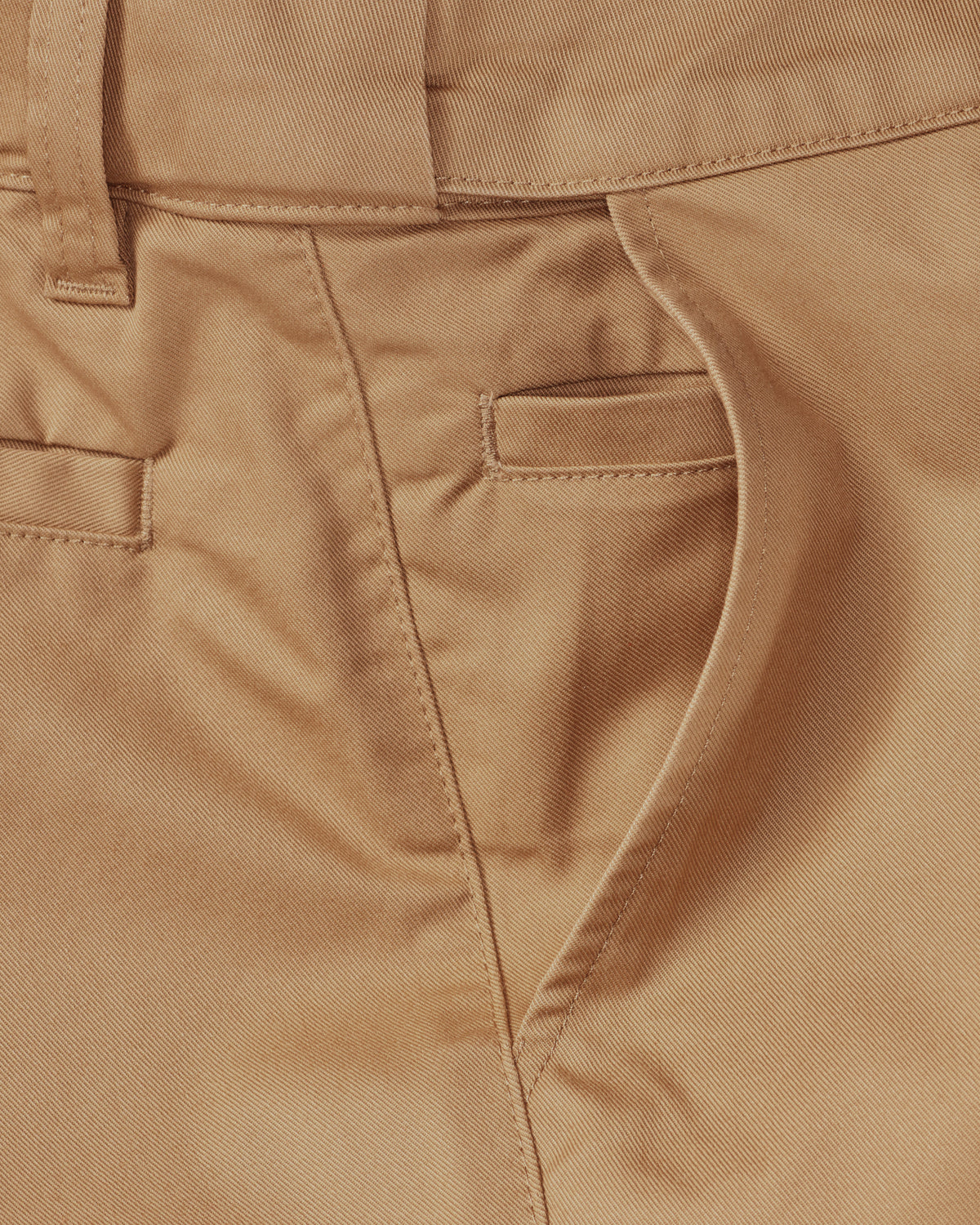 Close-up of chino fabric and seams on Chino Pants e.s.e:pic in almond brown
