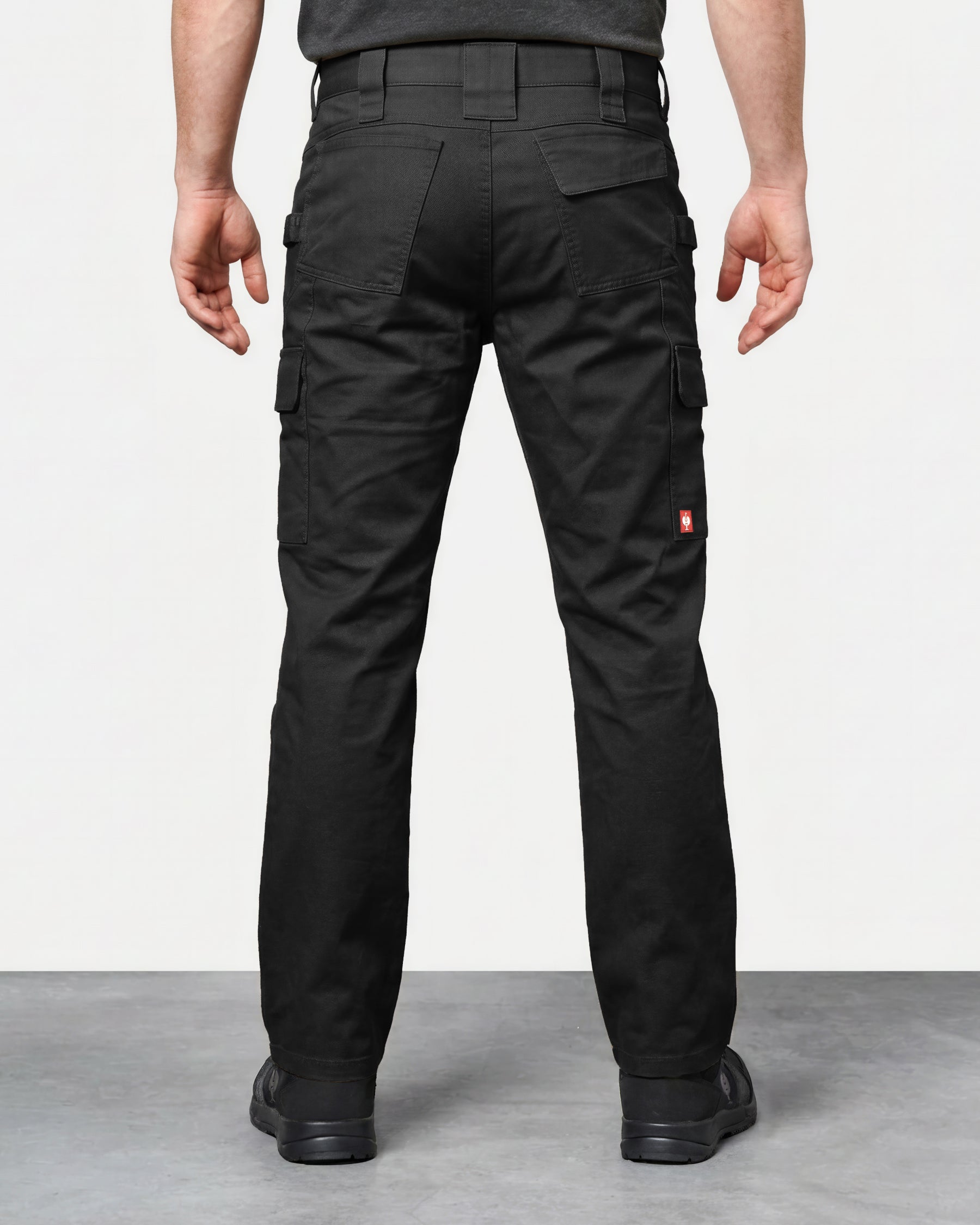 Twill Cargo Work Pants e.s.e:pic in black worn by a model, rear view