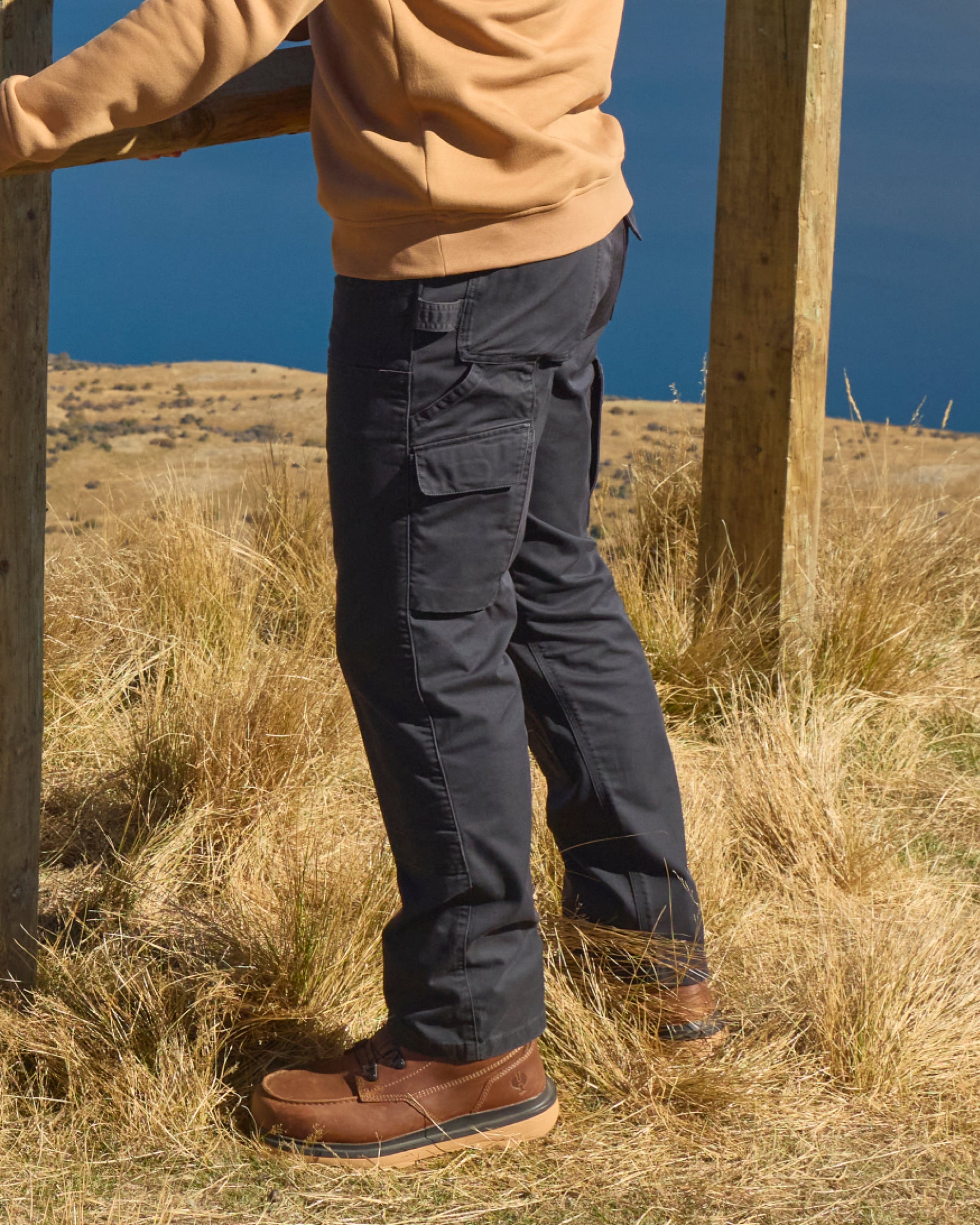 Twill Cargo Work Pants e.s.e:pic in black worn in a work setting