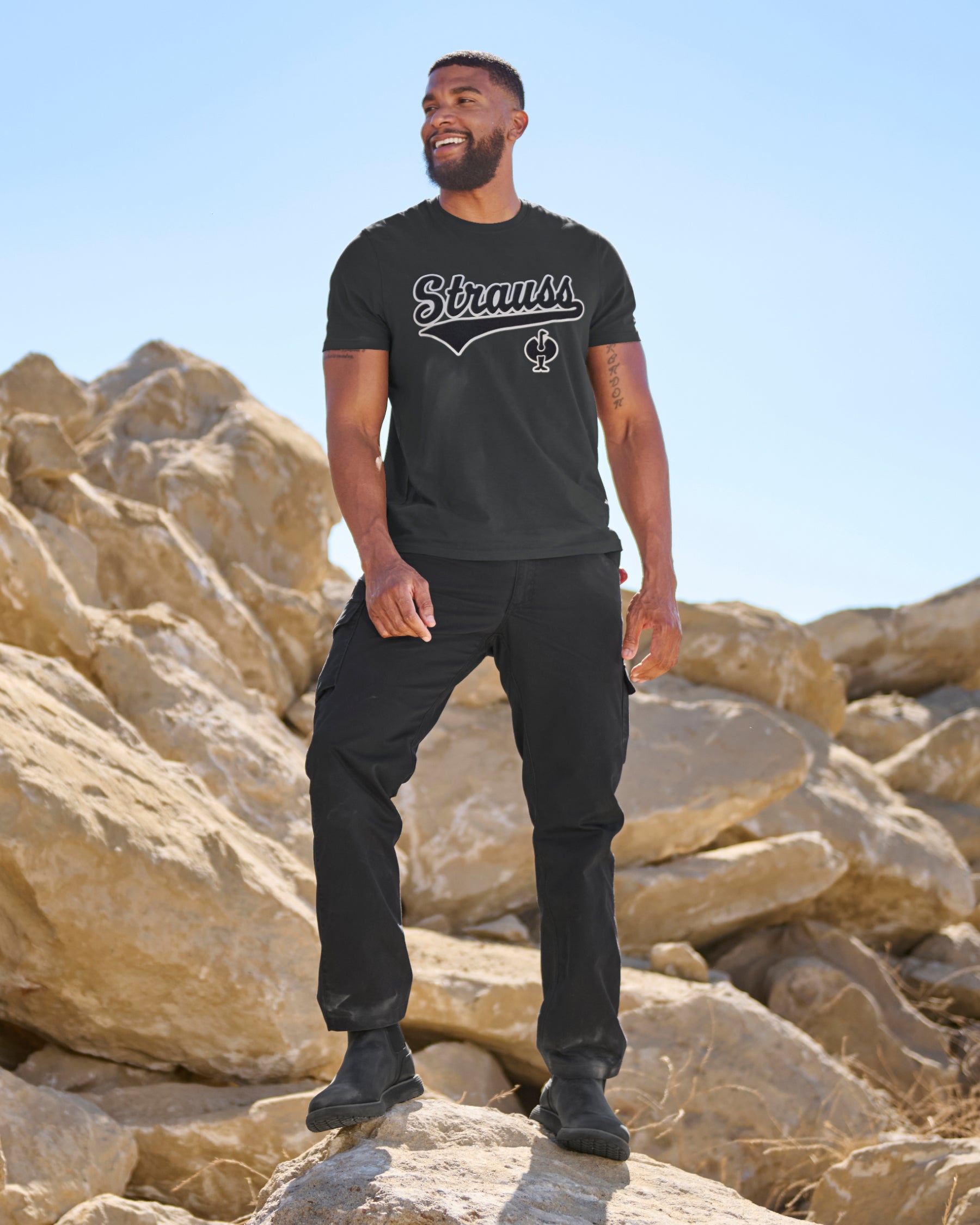 Twill Cargo Work Pants e.s.e:pic in black in use, showing fit and movement