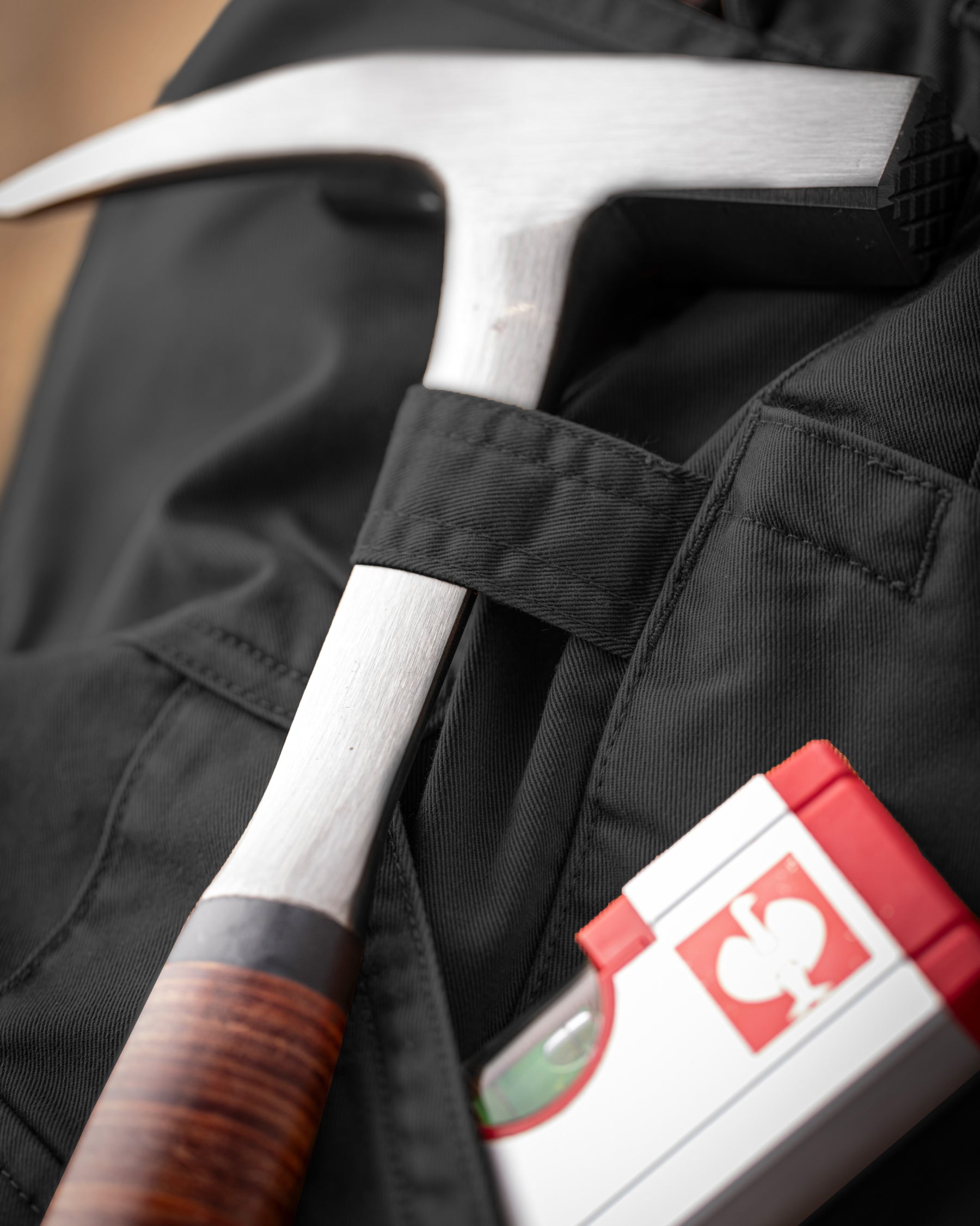 Close-up of cargo pocket details on Twill Cargo Work Pants e.s.e:pic in black