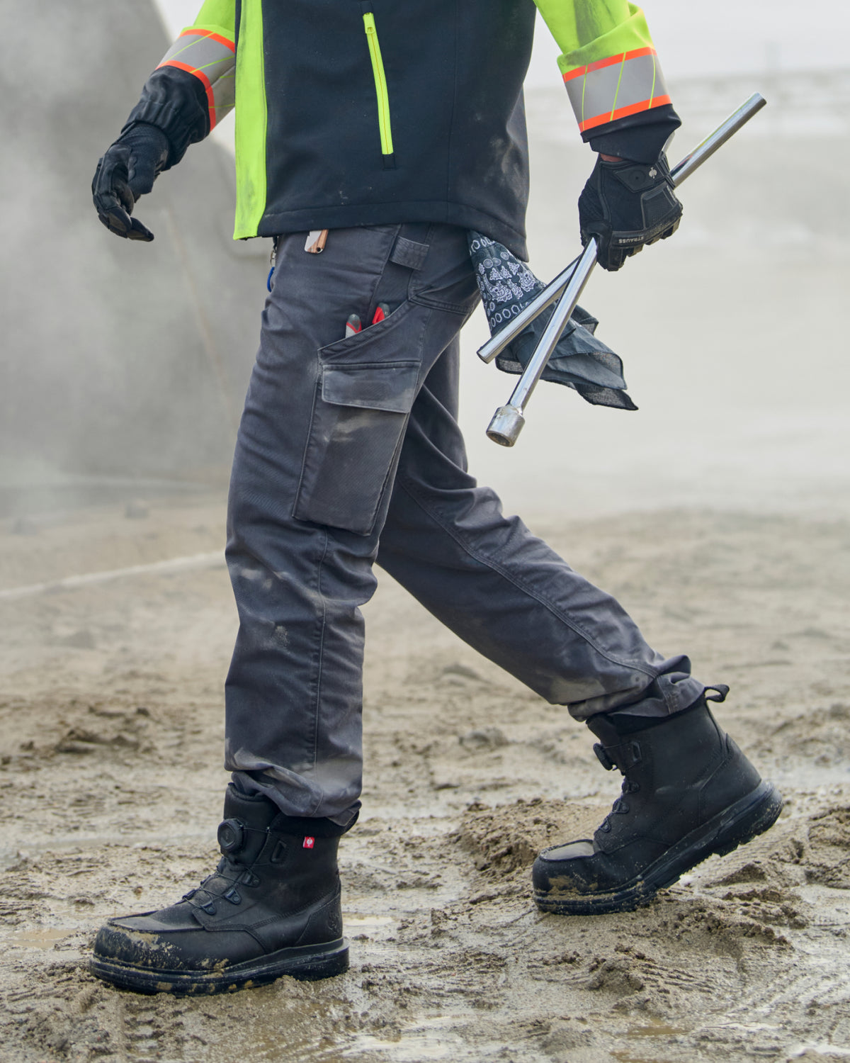 Twill Cargo Work Pants e.s.e:pic in carbon gray worn in a work setting