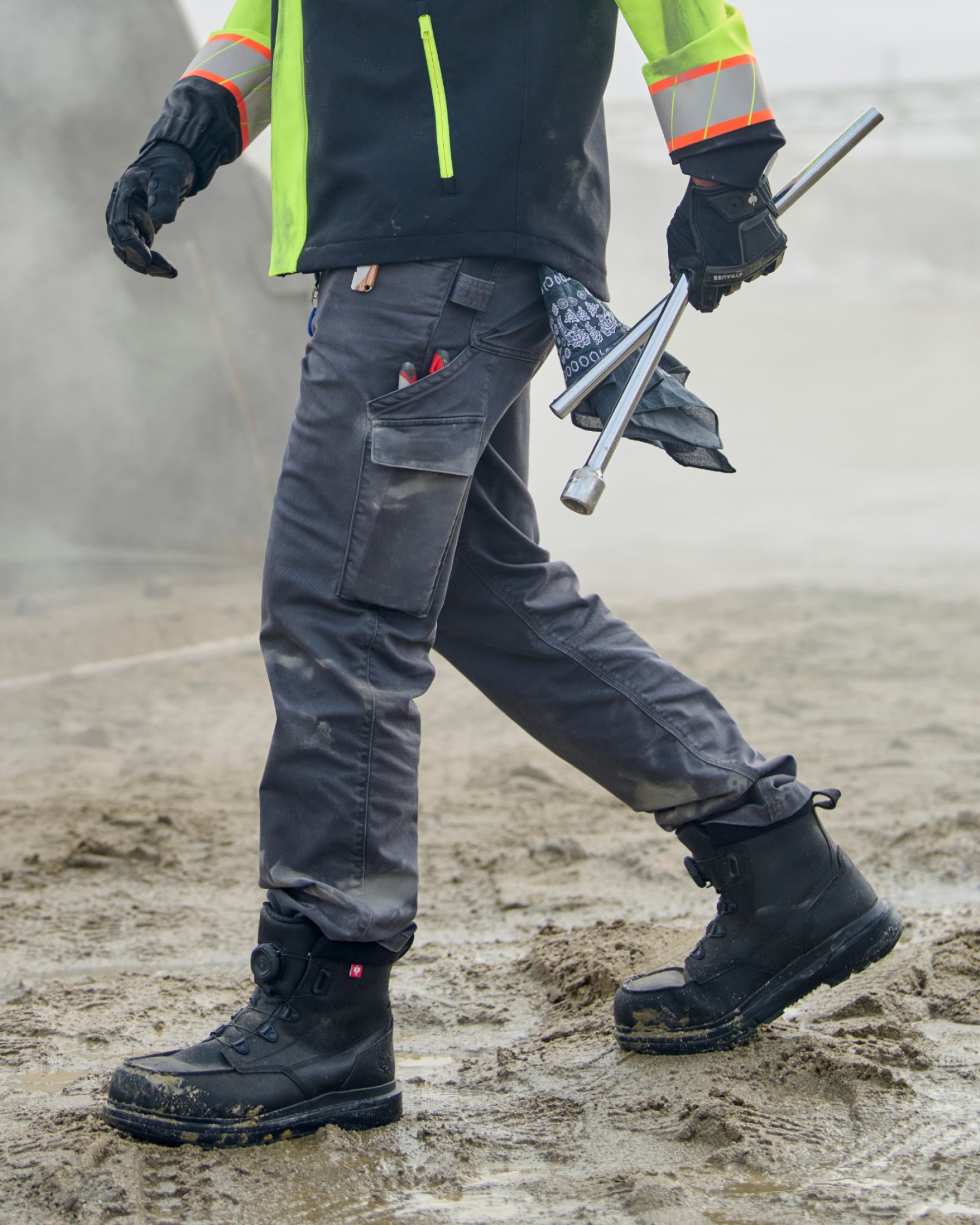 Twill Cargo Work Pants e.s.e:pic in carbon gray worn in a work setting
