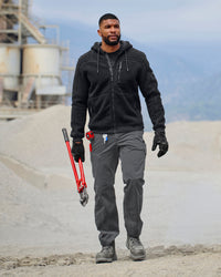 Twill Cargo Work Pants e.s.e:pic in carbon gray shown in an outdoor workwear setting
