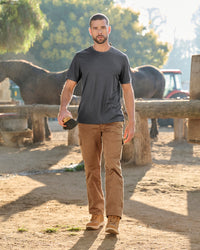 Twill Cargo Work Pants e.s.e:pic in almond brown in use, showing fit and movement