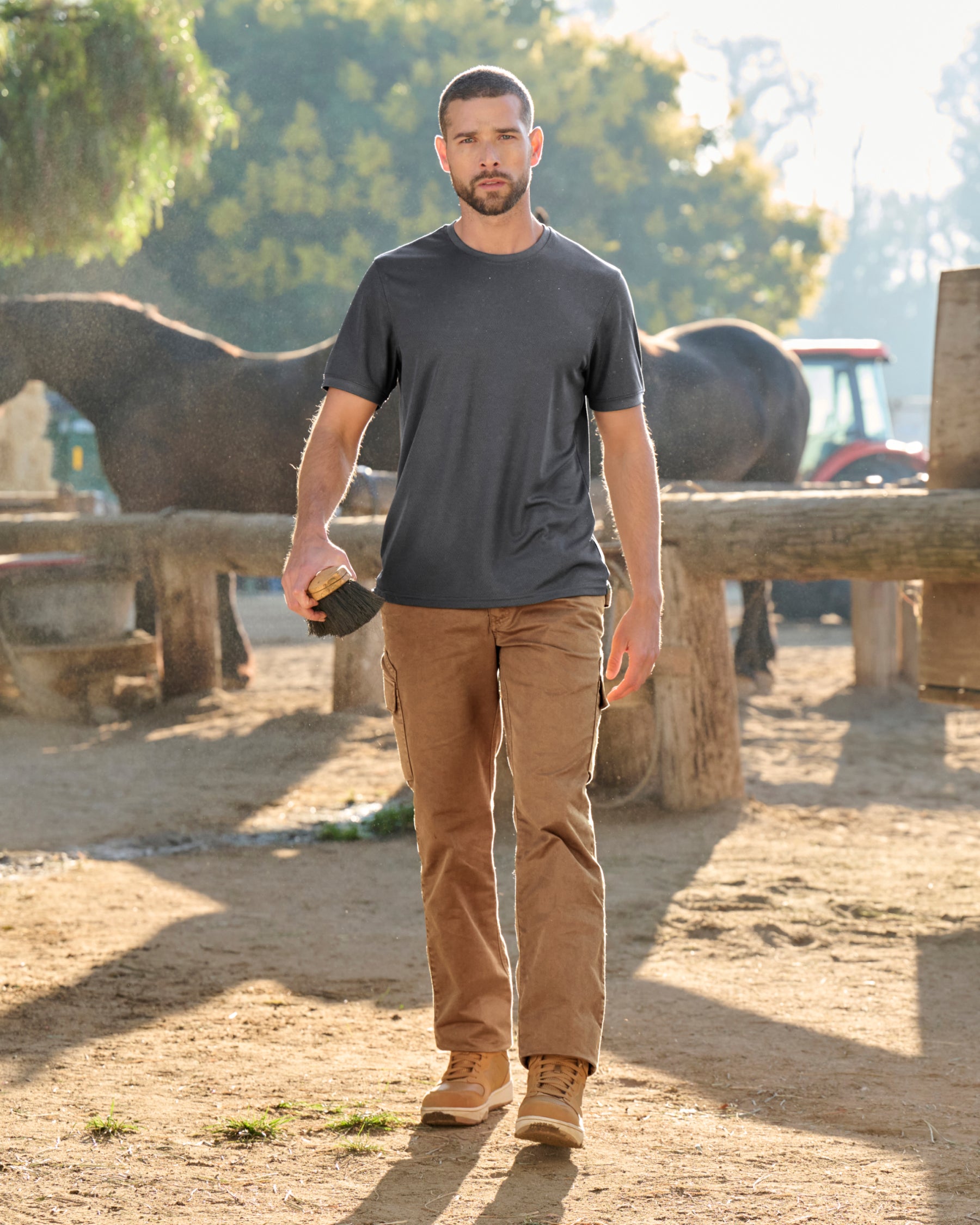 Twill Cargo Work Pants e.s.e:pic in almond brown in use, showing fit and movement
