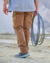 Twill Cargo Work Pants e.s.e:pic in almond brown shown in an outdoor workwear setting