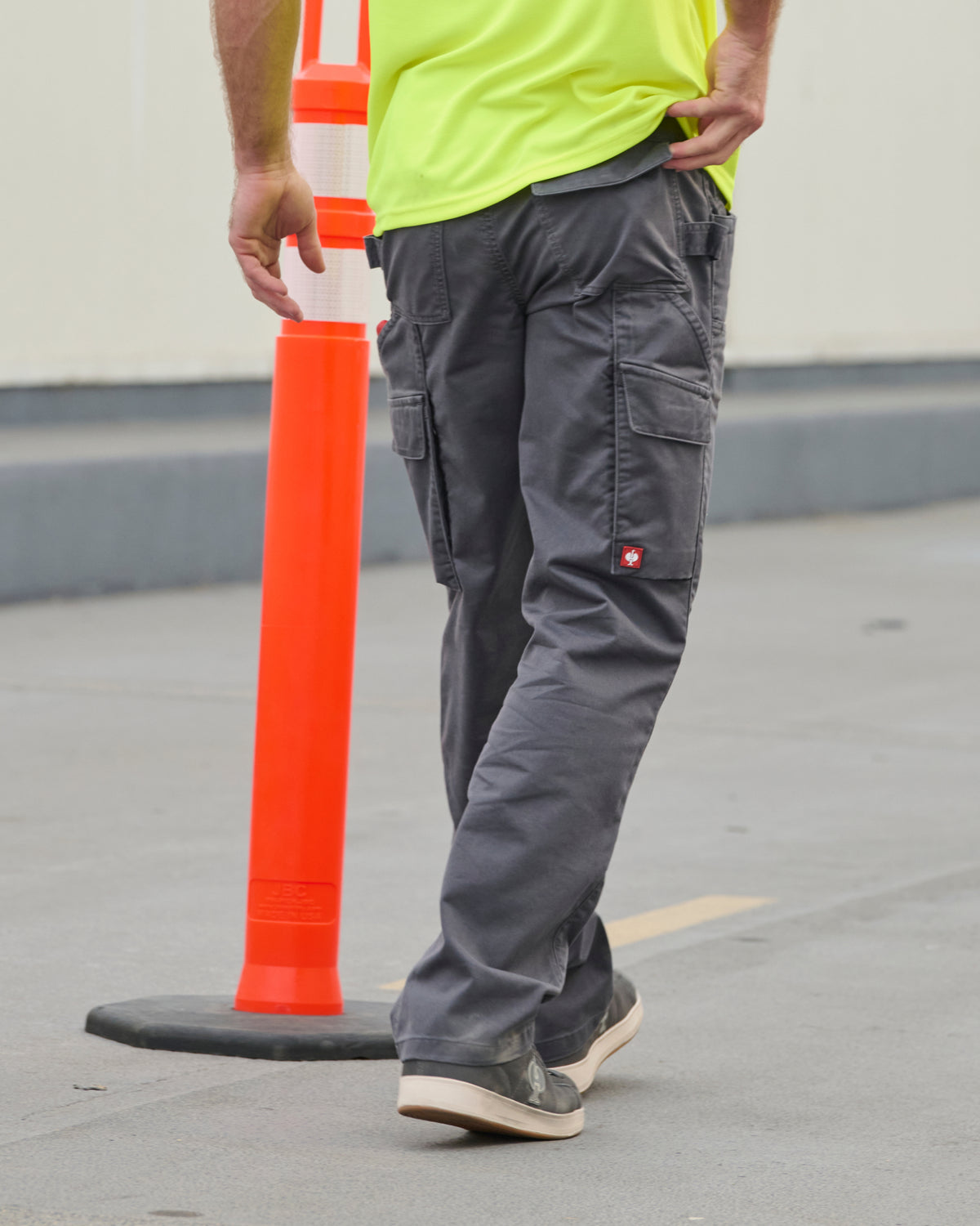 Double Front Twill Cargo Work Pants e.s.e:pic in carbon gray shown in an outdoor workwear setting