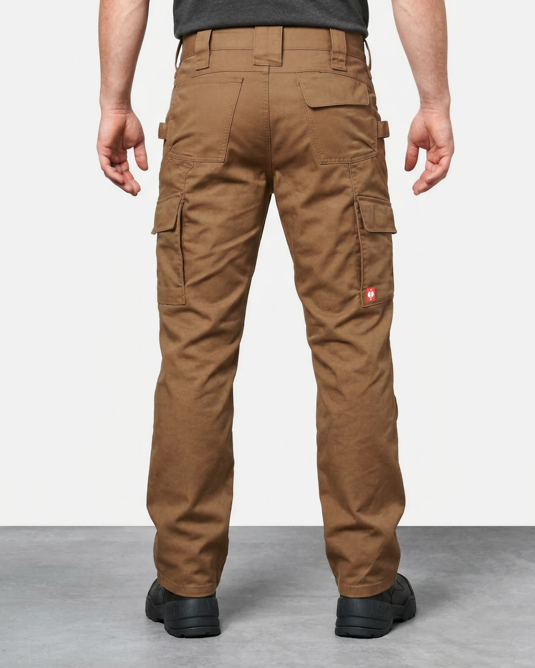 Double Front Twill Cargo Work Pants e.s.e:pic in almond brown worn by a model, rear view