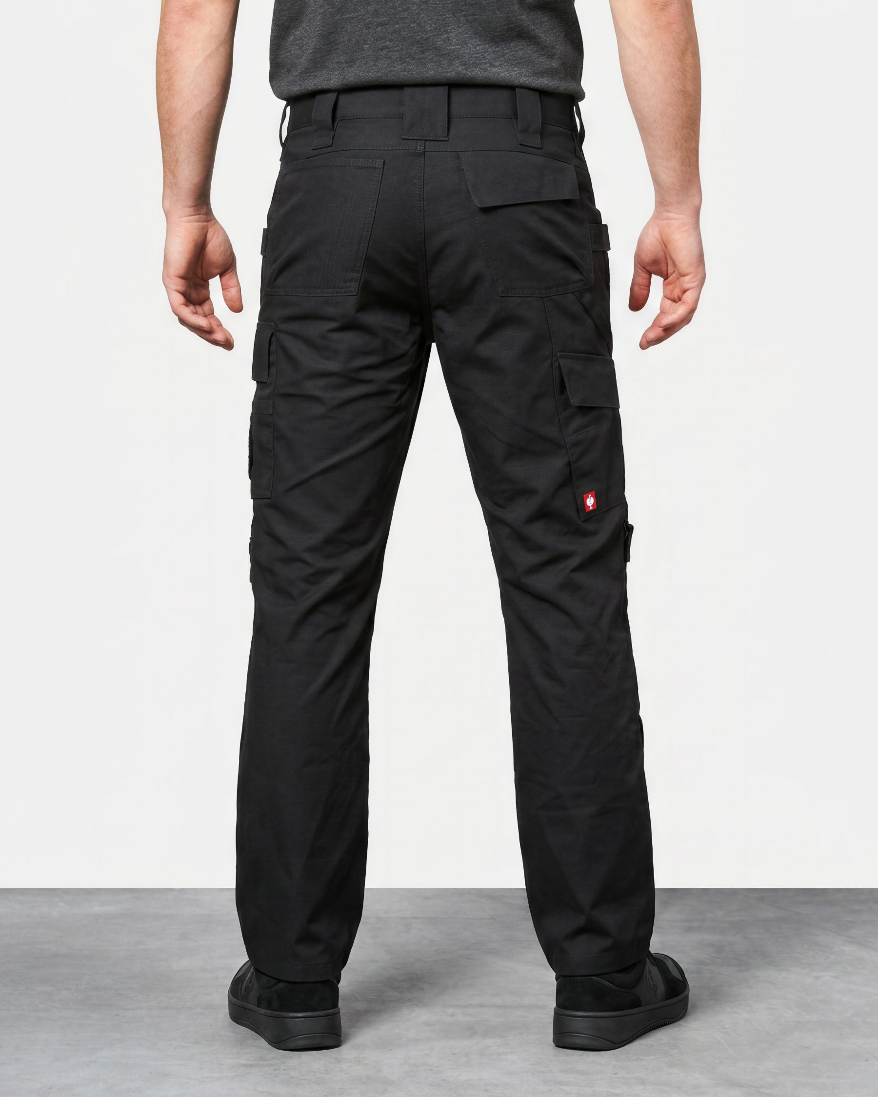 Ripstop Cargo Work Pants e.s.e:pic in black worn by a model, rear view