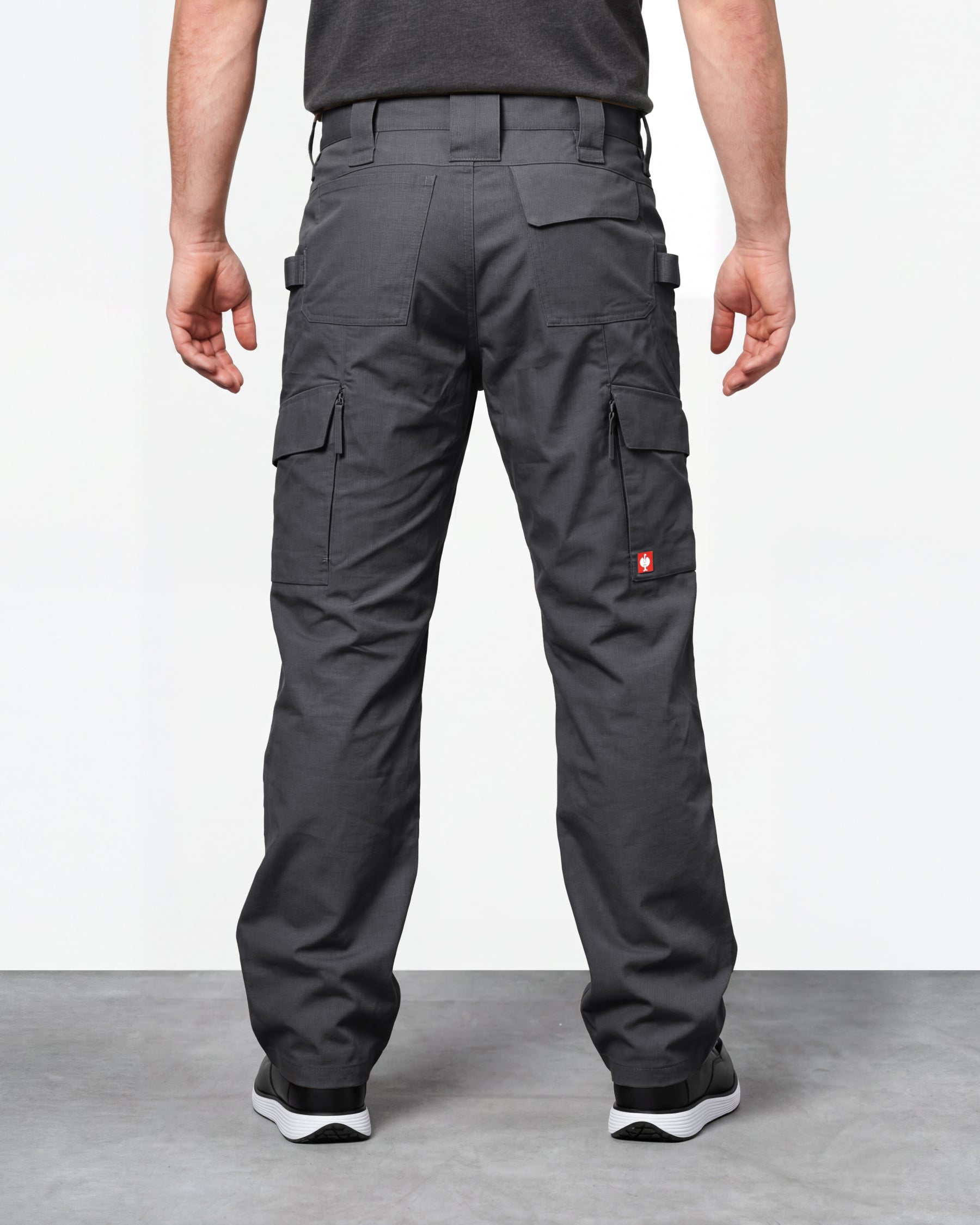 Double Front Ripstop Cargo Work Pants e.s.e:pic in carbon gray worn by a model, rear view