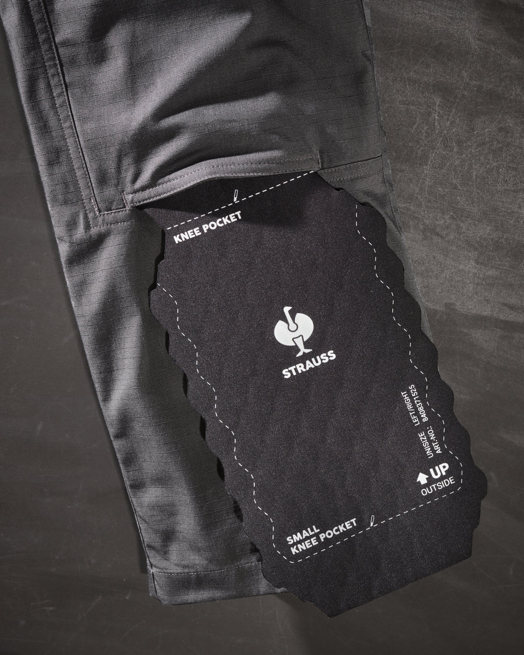 Close-up of knee pad pocket details on Double Front Ripstop Cargo Work Pants e.s.e:pic in carbon gray