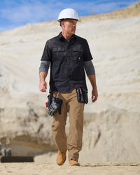 Double Front Ripstop Cargo Work Pants e.s.e:pic in almond brown shown in an outdoor workwear setting