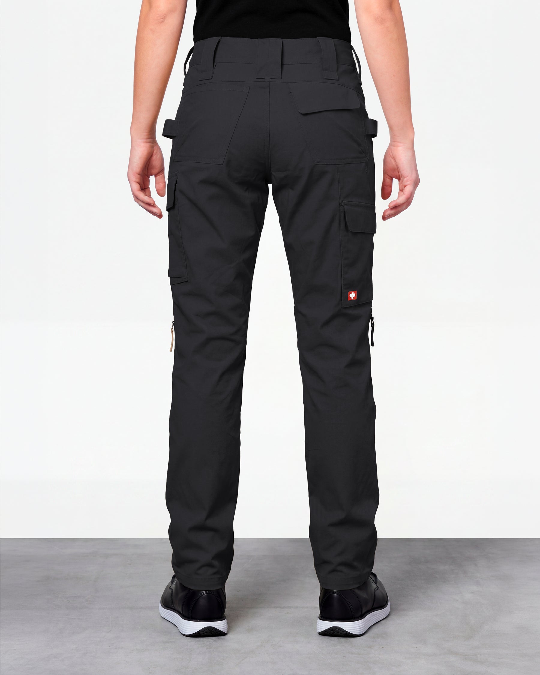 Women's Ripstop Cargo Work Pants e.s.e:pic in black worn by a model, rear view