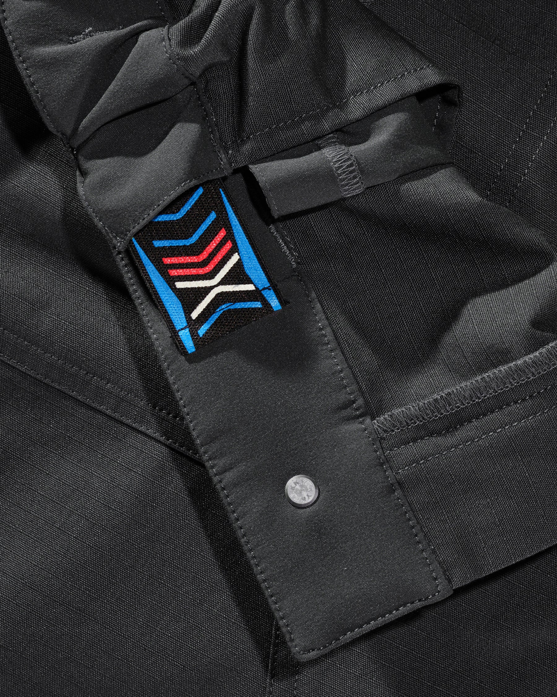 Close-up of reinforced fabric and seams on Women's Ripstop Cargo Work Pants e.s.e:pic in black