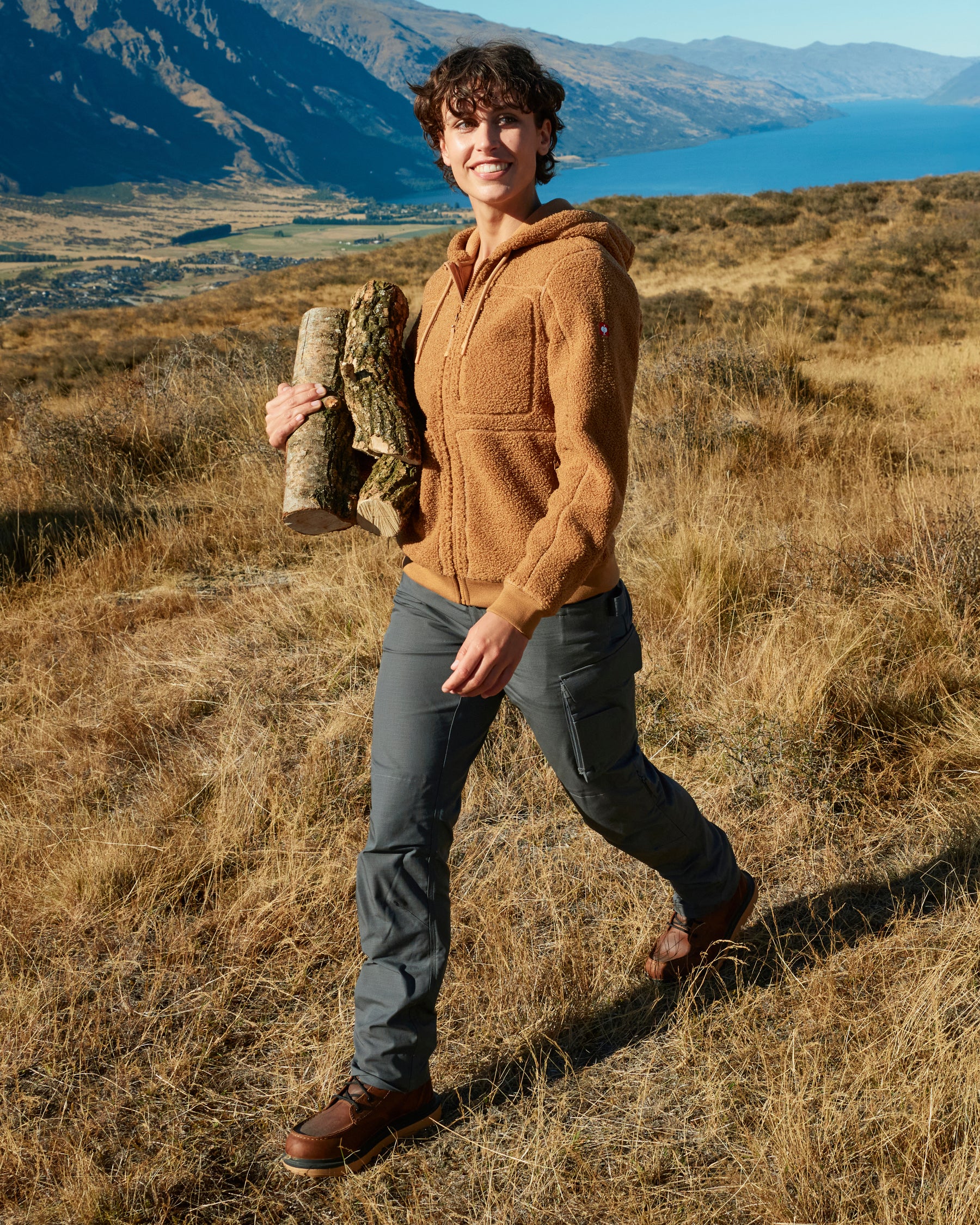 Women's Ripstop Cargo Work Pants e.s.e:pic in carbon gray shown in an outdoor workwear setting