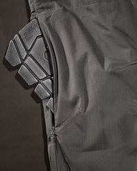 Close-up of knee pad pocket details on Women's Ripstop Cargo Work Pants e.s.e:pic in carbon gray