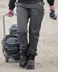 Women's Double Front Ripstop Cargo Work Pants e.s.e:pic in carbon gray worn in a work setting
