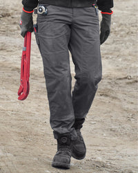 Lifestyle view of Women's Double Front Ripstop Cargo Work Pants e.s.e:pic in carbon gray during work