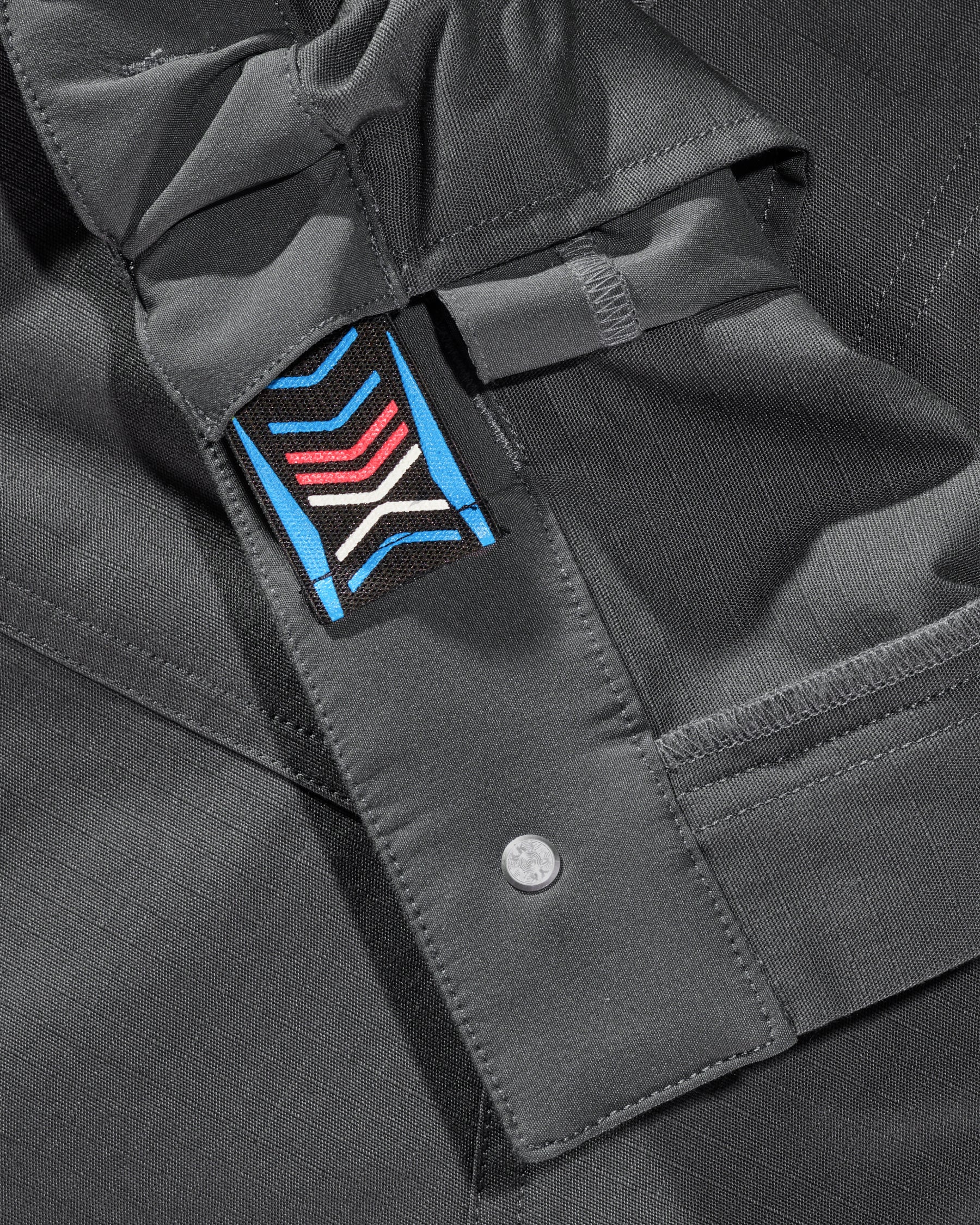 Close-up of cargo pocket details on Women's Double Front Ripstop Cargo Work Pants e.s.e:pic in carbon gray