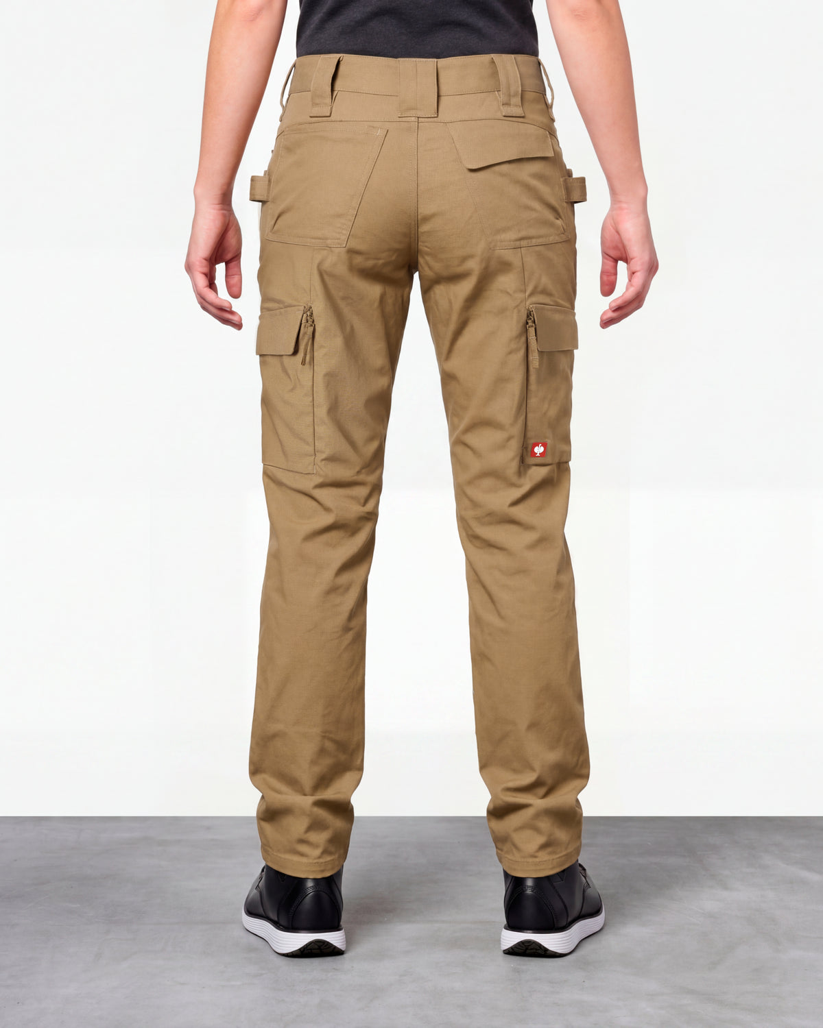 Women's Double Front Ripstop Cargo Work Pants e.s.e:pic in almond brown worn by a model, rear view