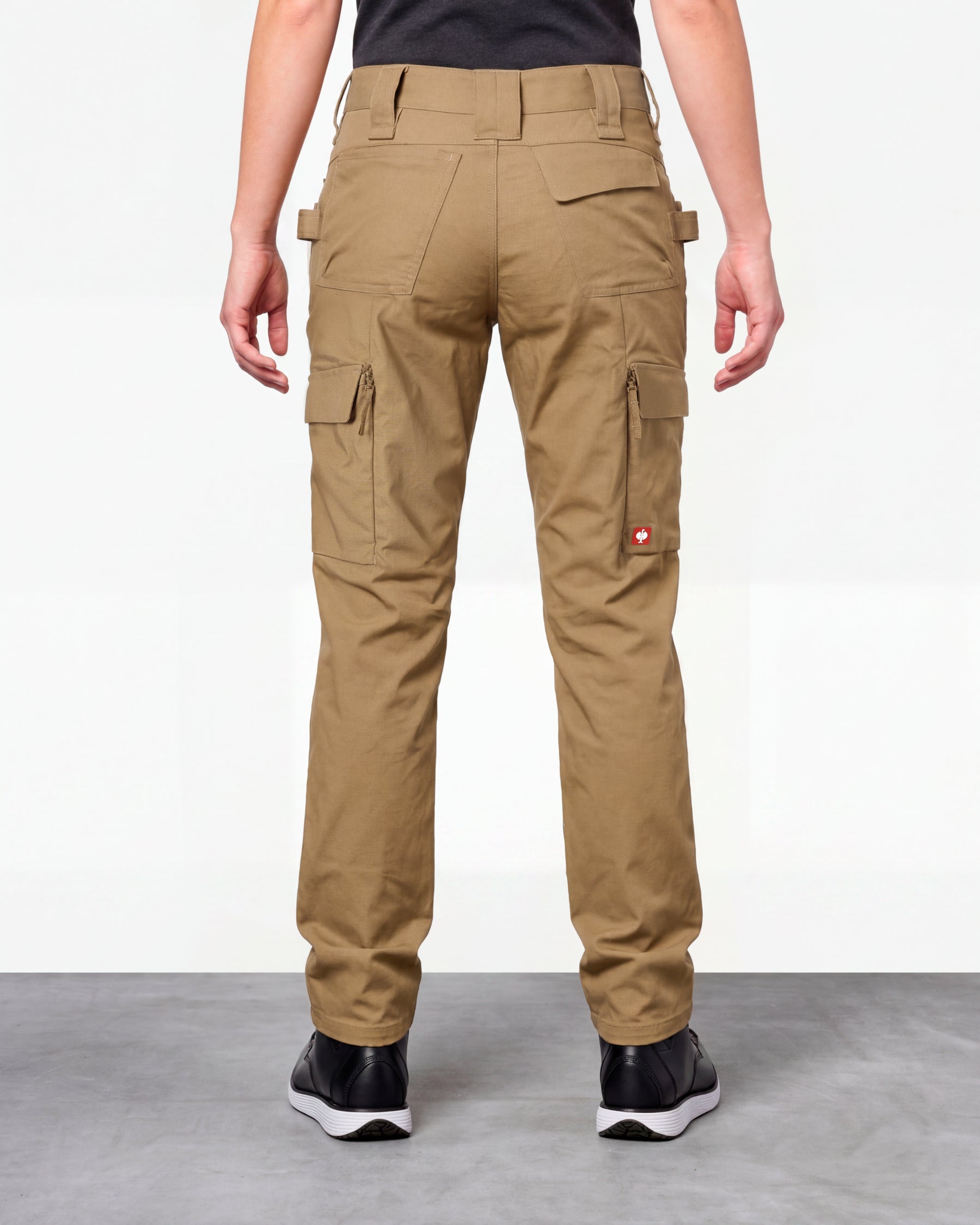 Women's Double Front Ripstop Cargo Work Pants e.s.e:pic in almond brown worn by a model, rear view