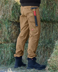 Lifestyle view of Women's Double Front Ripstop Cargo Work Pants e.s.e:pic in almond brown during work