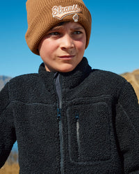 STRAUSS kids' e.s.e:pic sherpa fleece jacket in black paired with workwear