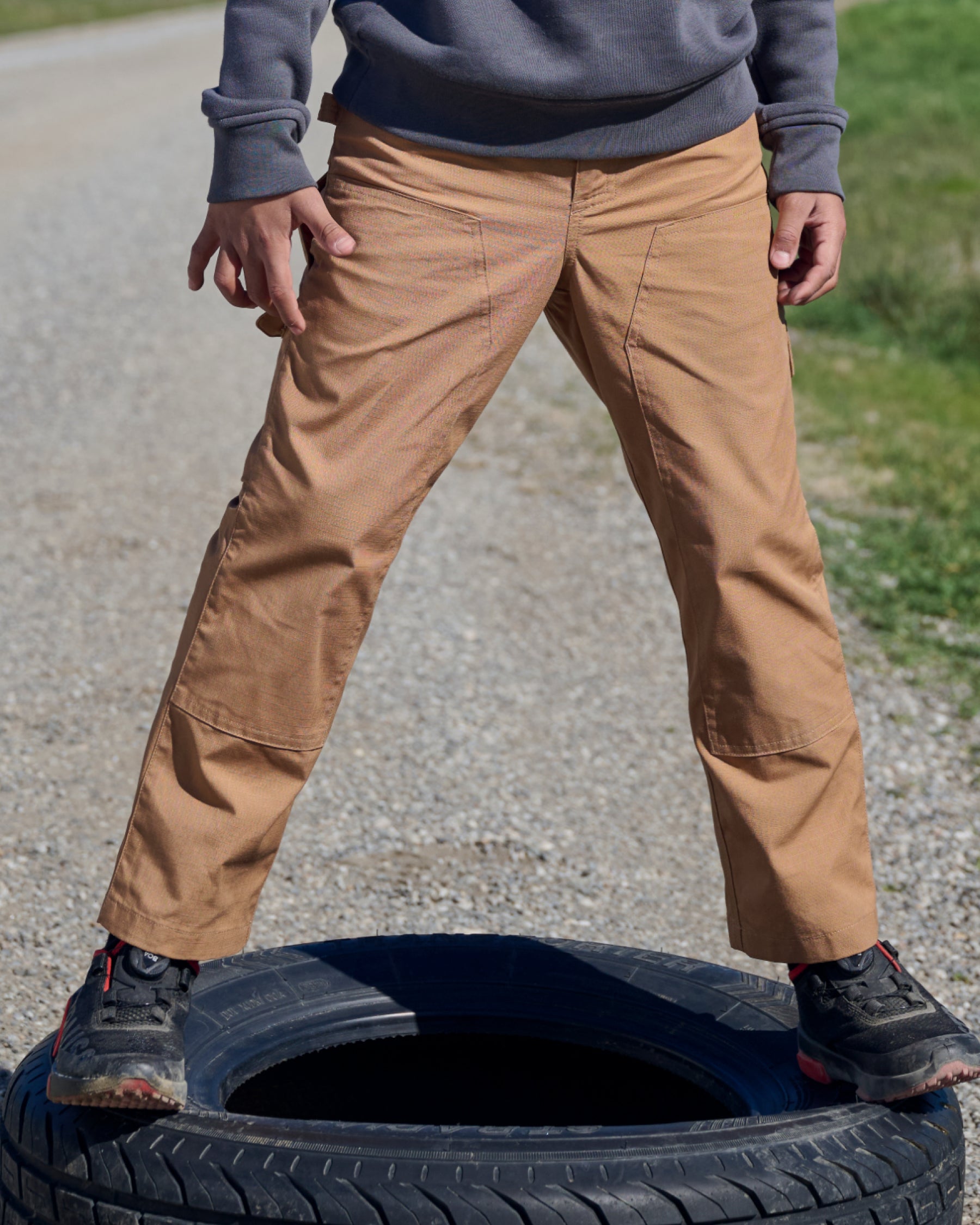 Kids' Double Front Ripstop Cargo Pants e.s.e:pic in almond brown worn in a work setting