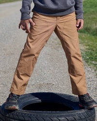 Kids' Double Front Ripstop Cargo Pants e.s.e:pic in almond brown worn in a work setting