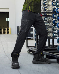 Stretch Ripstop Cargo Work Pants e.s.taktik in black worn in a work setting