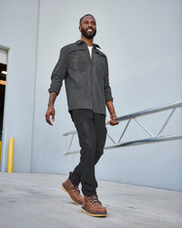 Stretch Ripstop Cargo Work Pants e.s.taktik in black in use, showing fit and movement