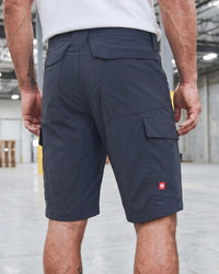 Engelbert Strauss e.s. taktik stretch ripstop cargo work shorts in nero blue in an additional lifestyle view, emphasizing the everyday utility, above-knee length, and rugged styling.