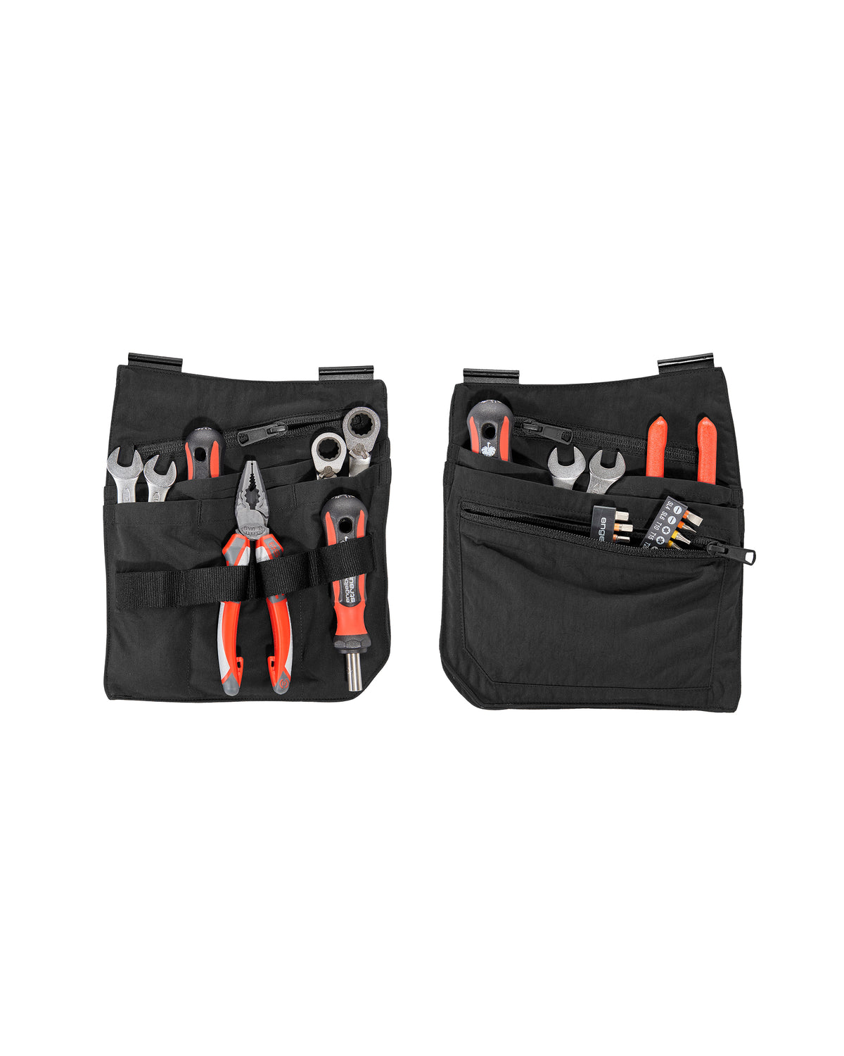 A worker wears a black STRAUSS e.s.concrete light tool bags on a tool belt with utility work pants.