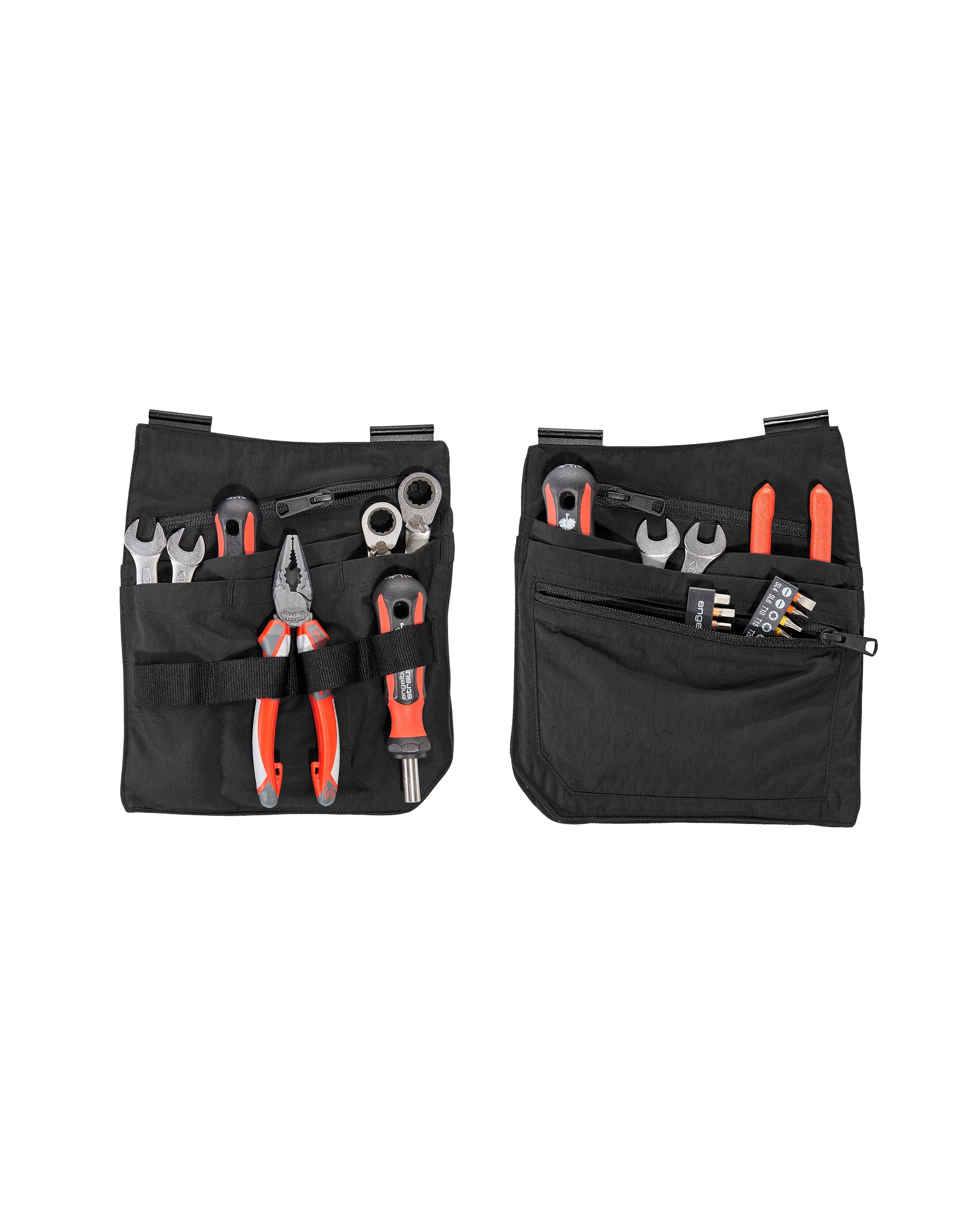 A worker wears a black STRAUSS e.s.concrete light tool bags on a tool belt with utility work pants.