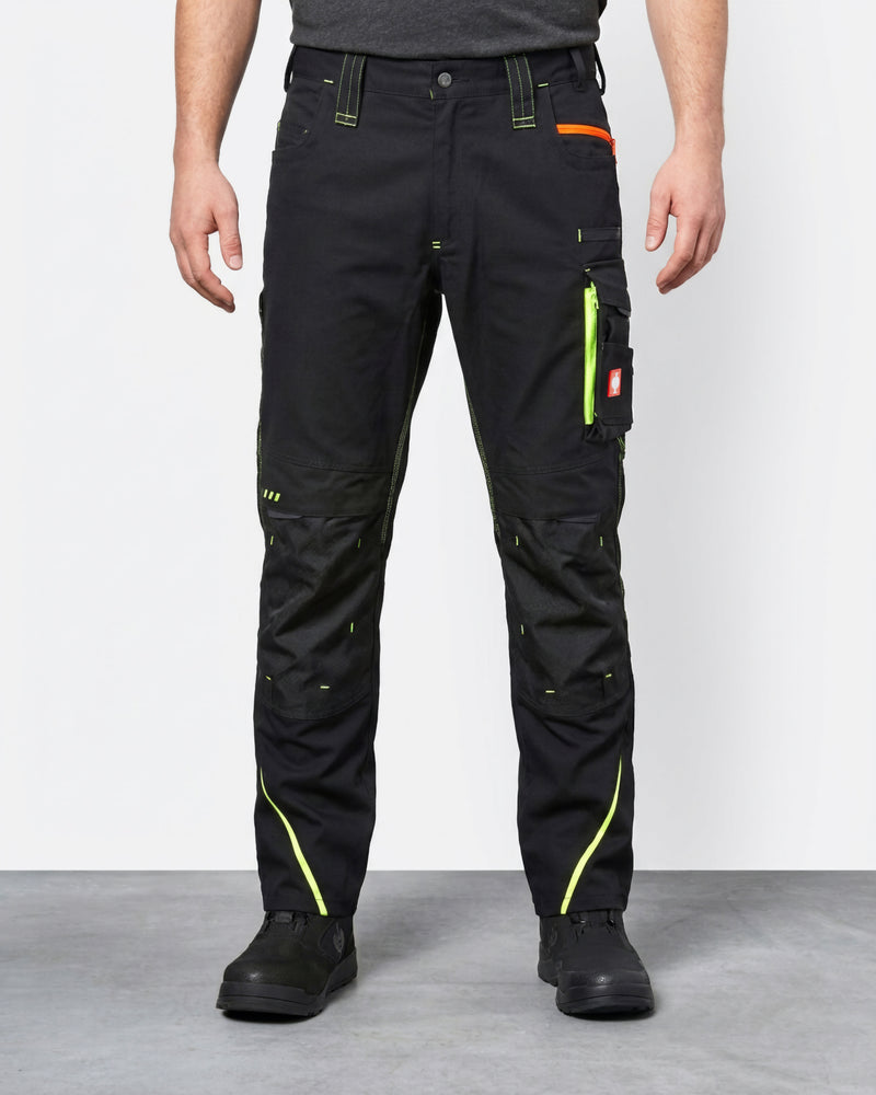 Cargo Work Pants e.s.motion 2020 in black/high-vis yellow-orange worn by a model, front view