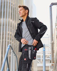STRAUSS e.s.motion 2020 softshell jacket in black worn in a work setting