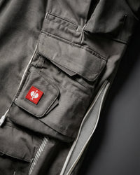 Close-up of cargo pocket details on Cargo Work Pants e.s.motion 2020 in stone/plaster