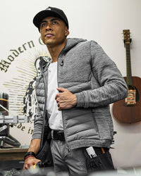 STRAUSS e.s.motion ten hybrid hooded jacket in gray melange worn in a work setting